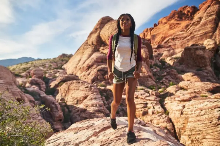A young women hiking in the southwest desert