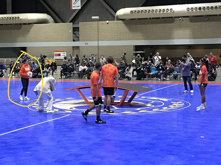 Carli Lloyd plays Teqball at the United Soccer Coaches Convention in Kansas City in 2022